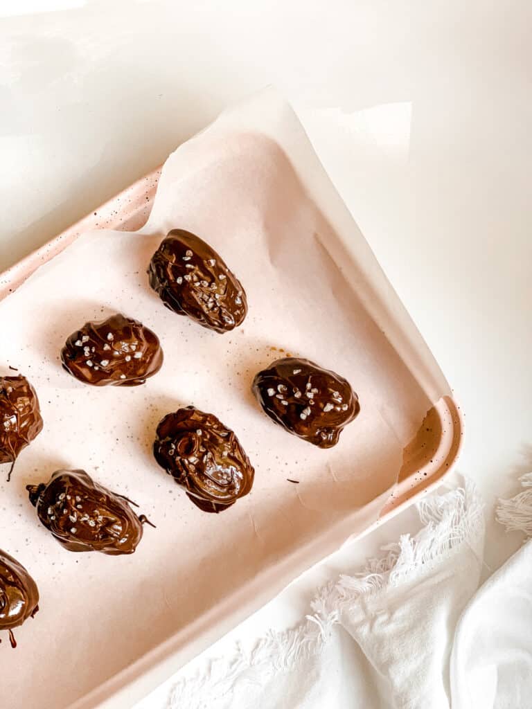 Pink Baking Sheet with Healthy Salted Chocolate Date Candies