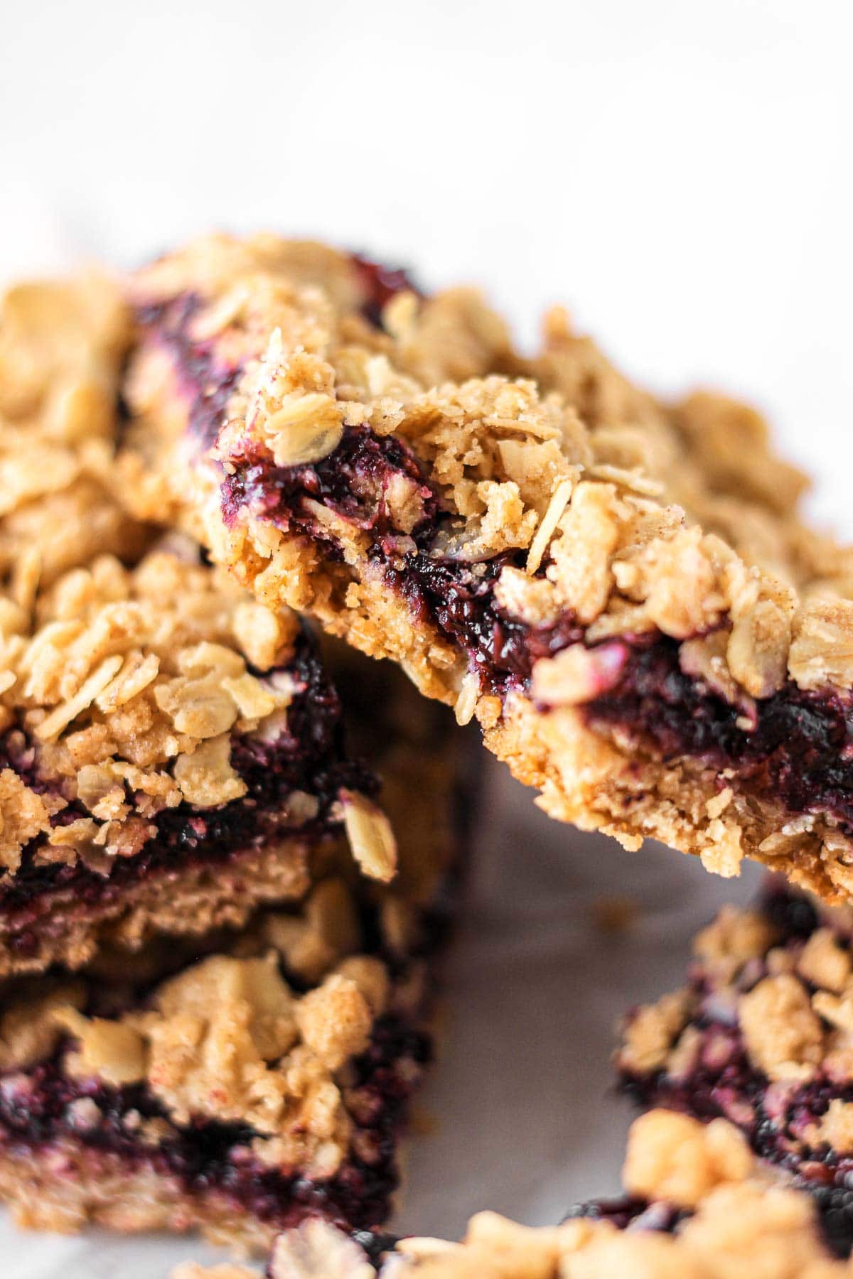 stack of blueberry oatmeal bars for baking blog and food photography