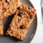 A healthy chocolate chip cookie bar on a grey plate.