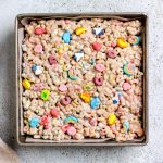 Lucky Charms rice krispie treats in a baking dish.
