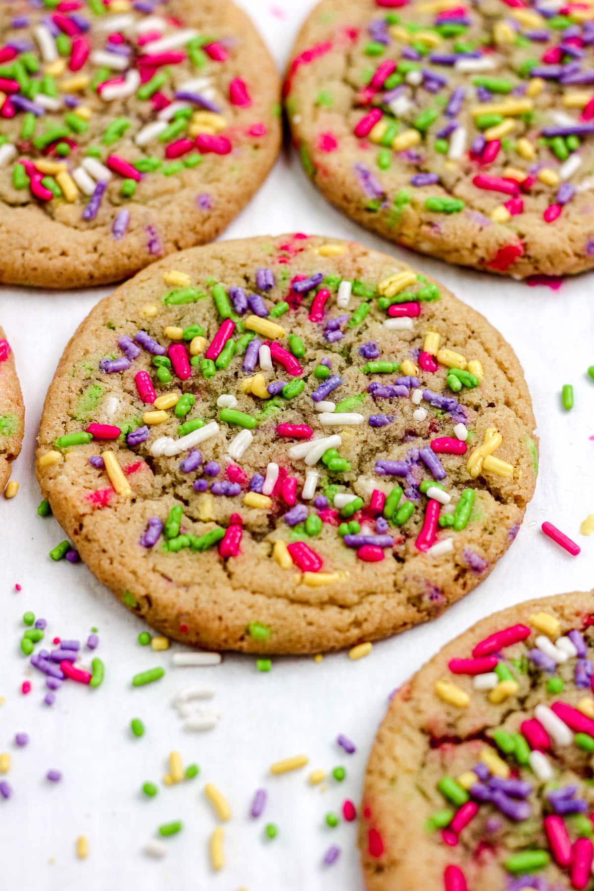 Sprinkle sugar cookies on a parchment paper lined baking sheet.
