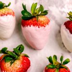 Pink chocolate covered strawberries.