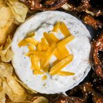 Ranch cream cheese beer dip with chips and pretzels.
