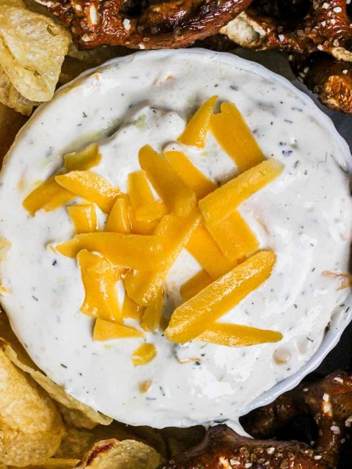 Ranch cream cheese beer dip with chips and pretzels.