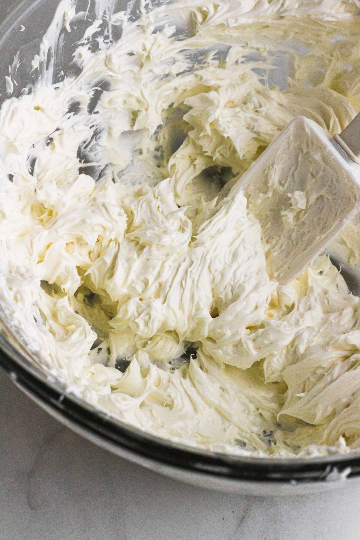 Whipped cream cheese in a bowl.