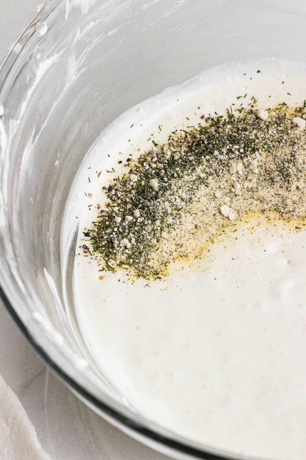 Ranch spice mix sprinkled on top of cream cheese dip.
