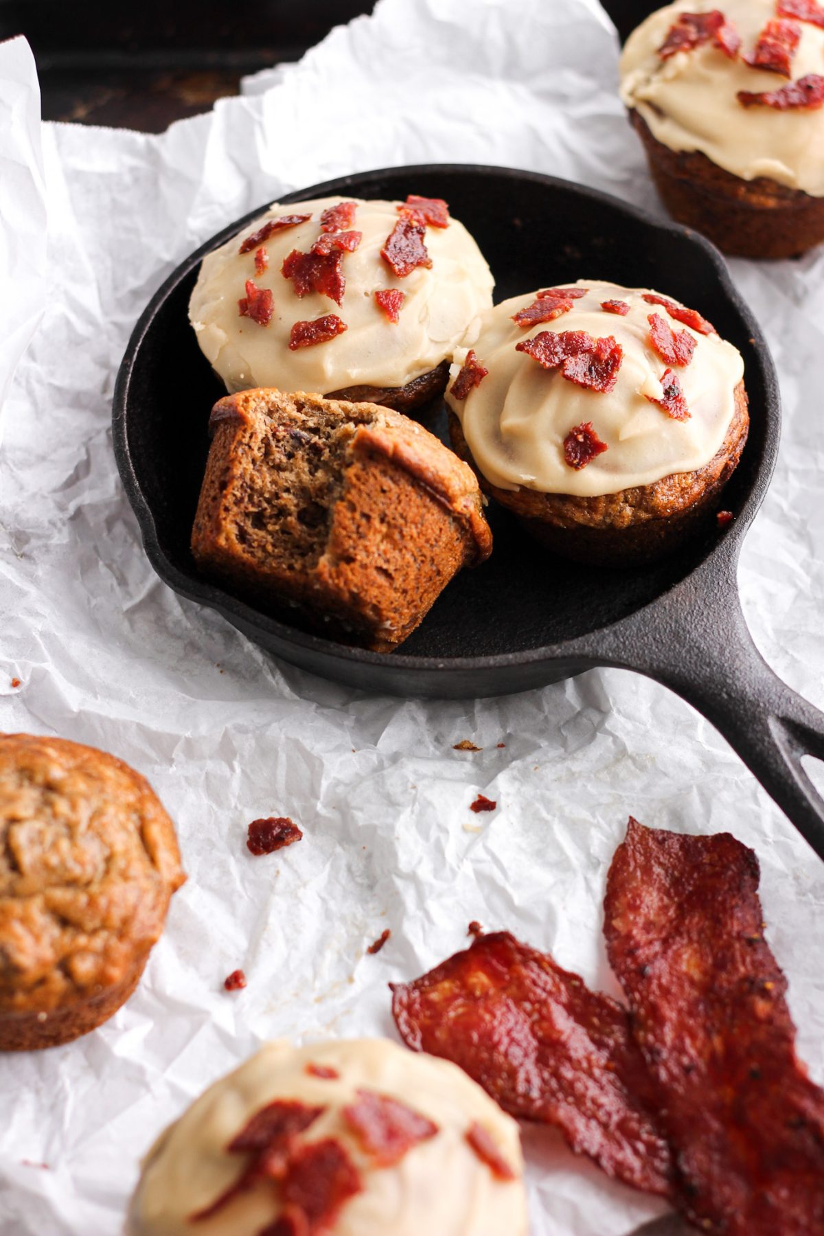 Banana Maple Glazed Pecan Muffins banana muffin with maple glaze and bacon in mini cast iron skillet for food blog and food photography
