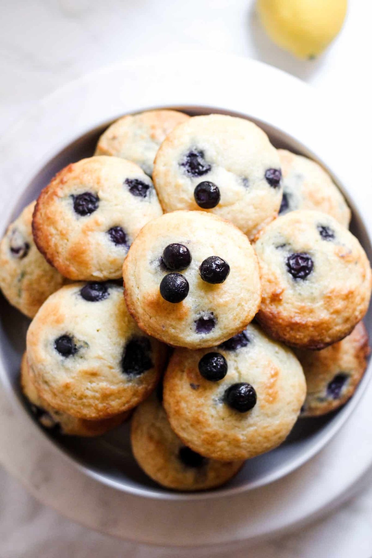 Bowl of Healthy Breakfast Muffins with Blueberries and Lemon for Food Blog