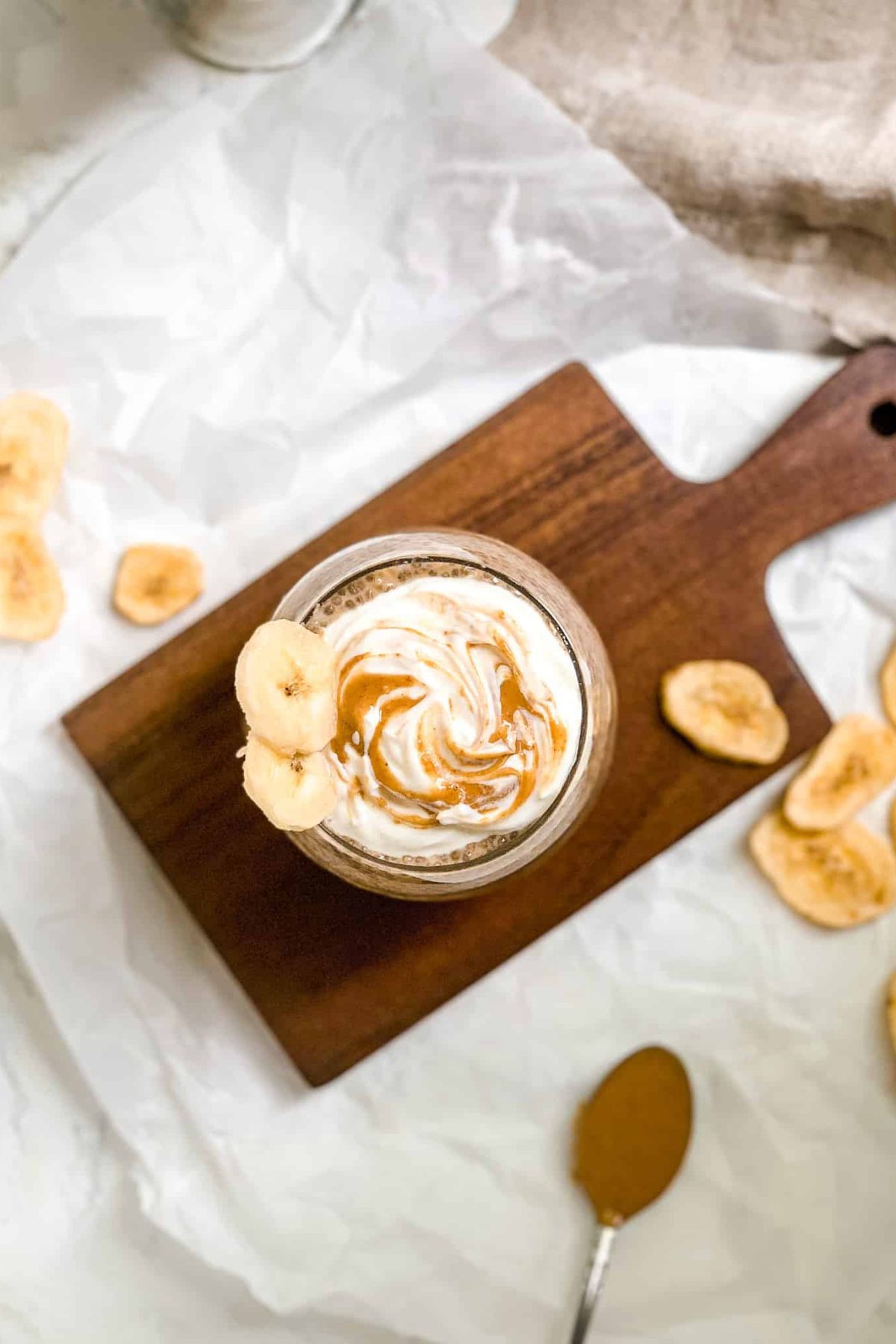 Vegan Breakfast Pudding in a Wine Glass with Fruit and Nut Butter